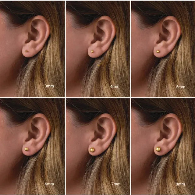 Size comparison of 14K yellow gold ball stud earrings on a model's ear, shown in 3mm, 4mm, 5mm, 6mm, 7mm and 8mm.