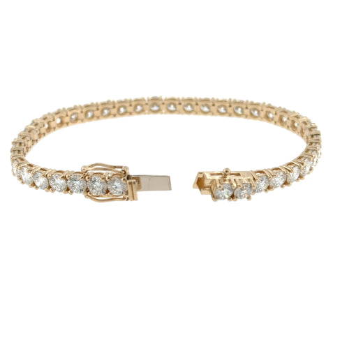 Load image 1 in gallery view. Box clasp open on the yellow gold tennis bracelet, showing the double figure-8 safety catches