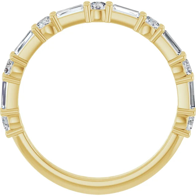 Yellow gold round and baguette lab-grown diamond band seen face-on through the finger opening