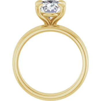 Profile view of the 14K yellow gold oval solitaire engagement ring showing the four-prong setting