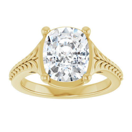 Load image 1 in gallery view. Face-up view of the 3 carat elongated cushion diamond in four prongs, the hand-engraved leaf pattern fanning out across both shoulders of the yellow gold band