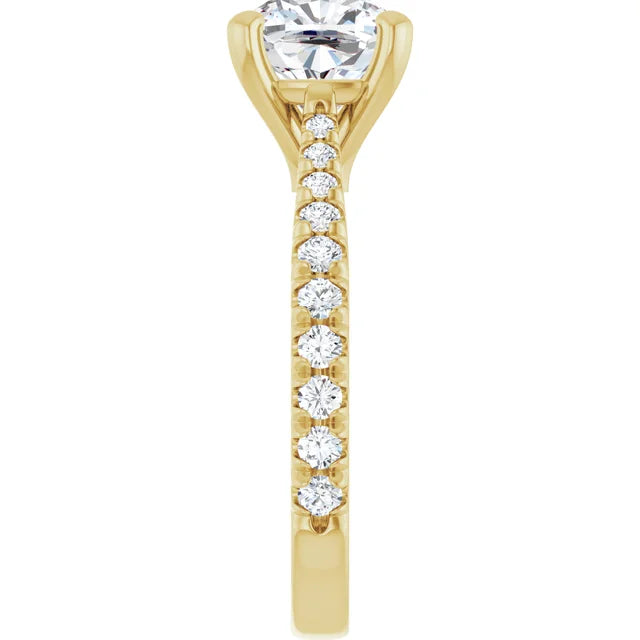 End-on view down the band, showing the individual French-set pave diamonds and the cushion center stone above them