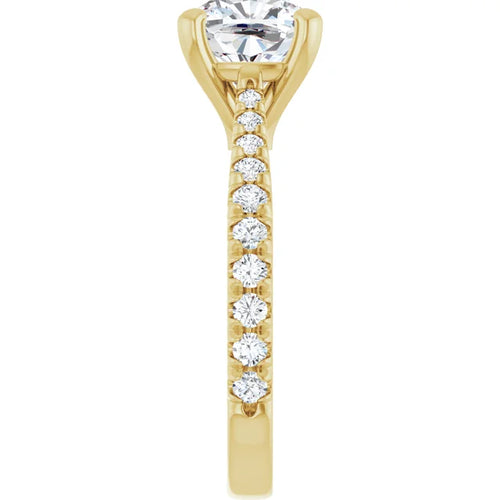 Load image 1 in gallery view. End-on view down the band, showing the individual French-set pave diamonds and the cushion center stone above them