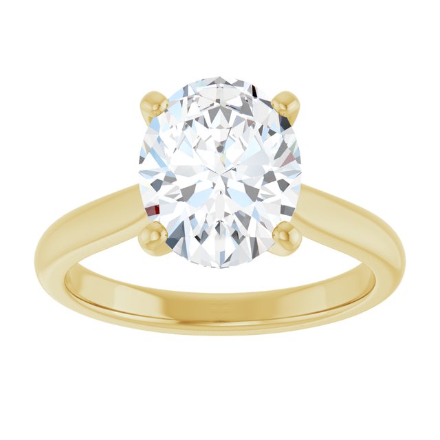 Top view of the 2.25 carat oval lab-grown diamond centred in four prongs, the yellow gold band tapering away on either side