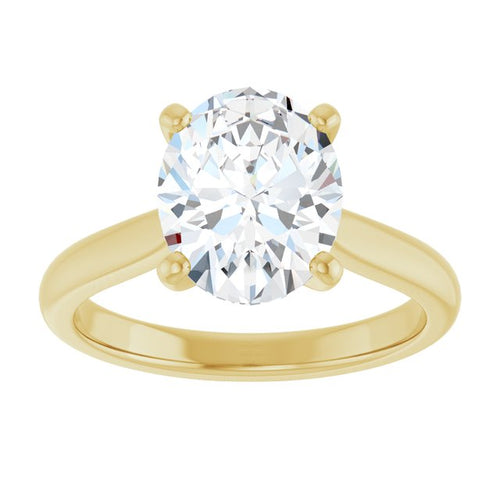 Load image 1 in gallery view. Top view of the 2.25 carat oval lab-grown diamond centred in four prongs, the yellow gold band tapering away on either side