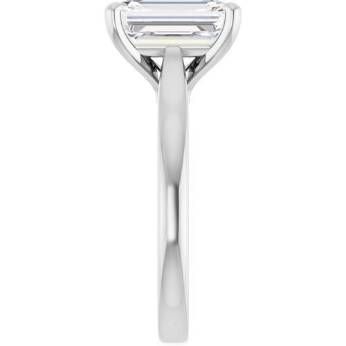 Load image 1 in gallery view. Side profile of the ring in 14K white gold, the band seen edge-on with the prongs cradling the emerald-cut diamond above it
