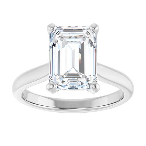 Load image 1 in gallery view. Face-up view of the emerald-cut diamond in 14K white gold, its long step facets held in four prongs on a plain polished band