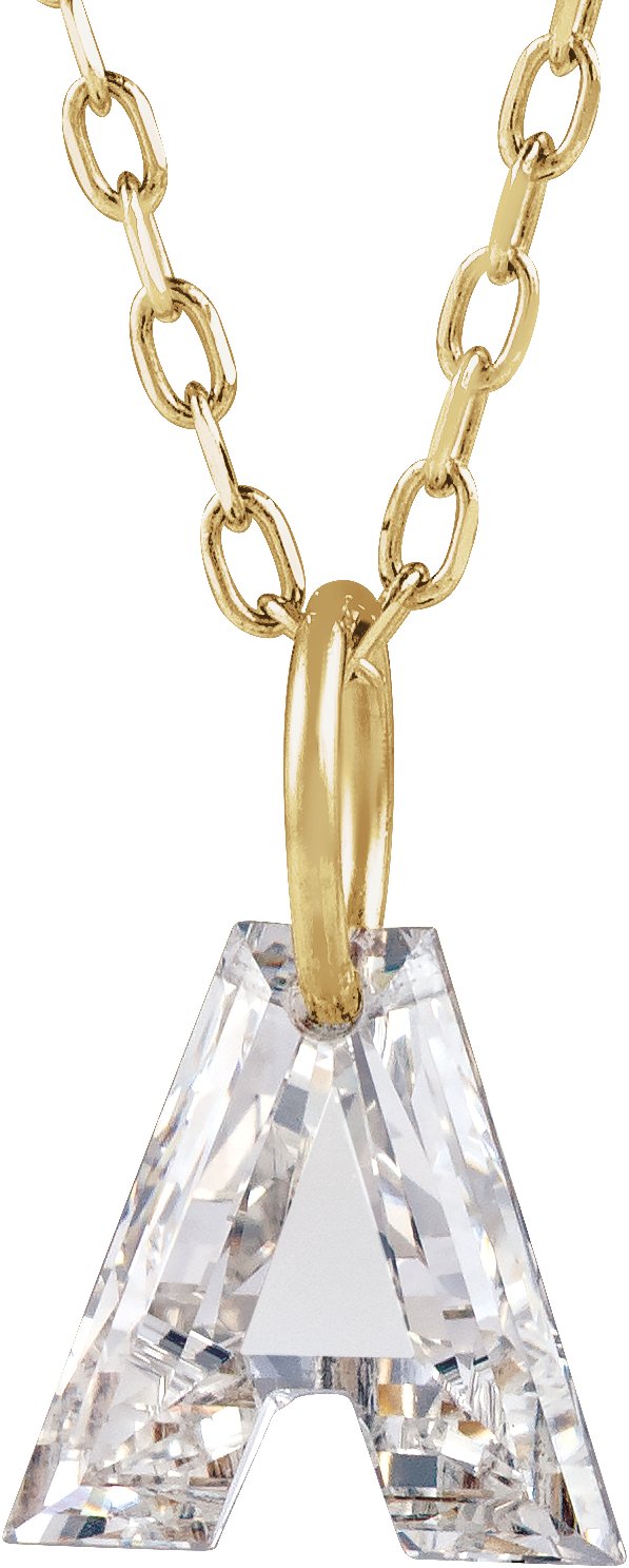 Close view of the letter-cut lab-grown diamond in 14K yellow gold