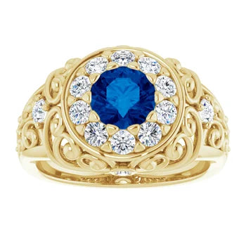 Load image 1 in gallery view. Gold  vintage ring with blue gemstone and diamond accents on a white background