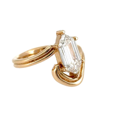Load image 1 in gallery view. Side view of the lab-grown hexagon step-cut diamond bypass ring in 14K yellow gold