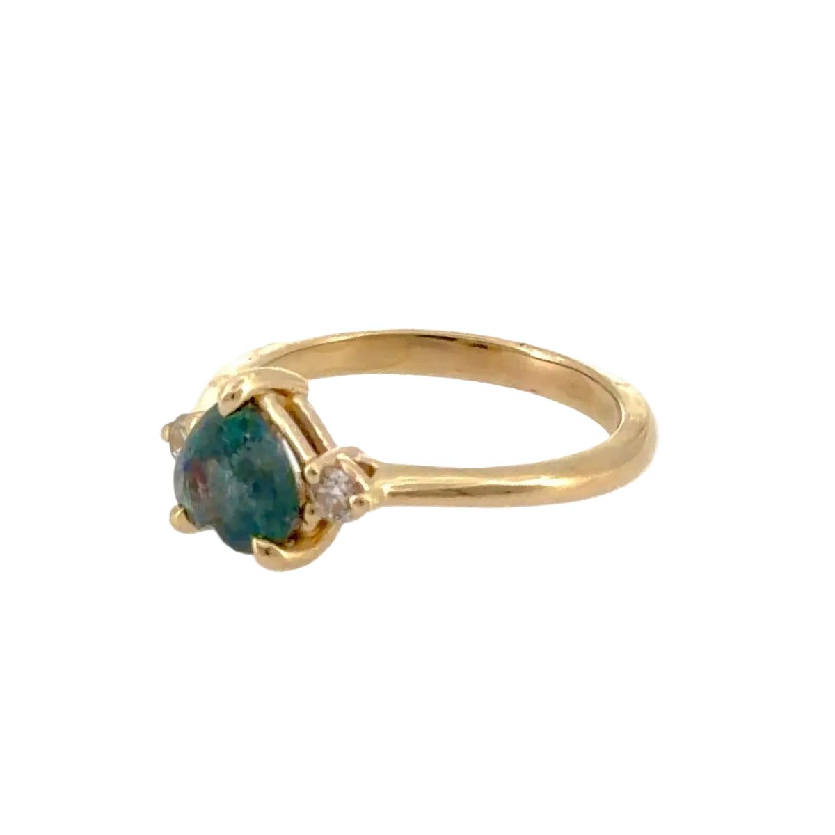 Heart-shape alexandrite three-stone ring in 14K yellow gold, side view of the setting, Farsi Jewelers