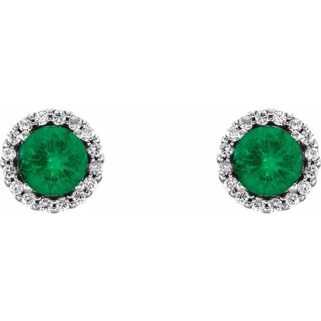 Both green lab-grown emerald halo studs shown face-on, each round emerald held in prongs and circled by a ring of small round diamonds in white gold.