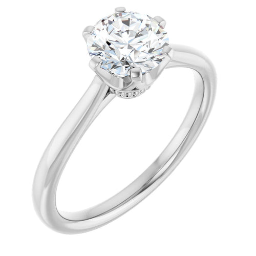 Load image 1 in gallery view. 10K white gold round moissanite solitaire ring at a three-quarter angle, showing the six-prong crown head and the slim tapered band