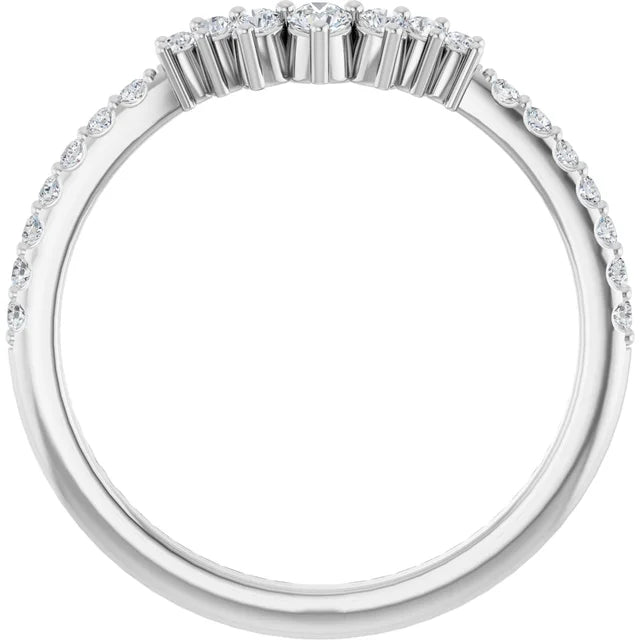The 14K white gold contour band seen through the finger opening, showing the V of larger prong-set diamonds across the top and the smaller graduated rounds running down each side