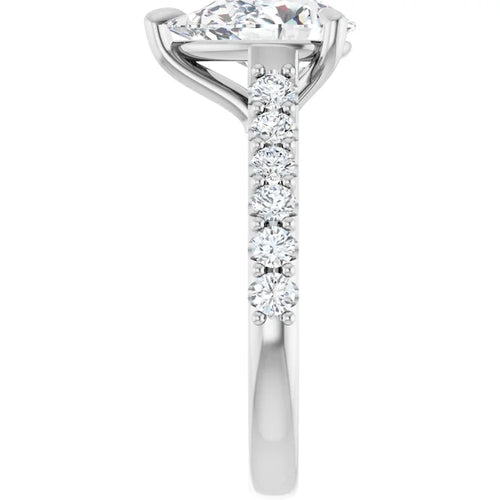 Load image 1 in gallery view. Side profile of the 14K white gold pear engagement ring, showing the row of round accent diamonds set along the shoulder and the band tapering toward the back