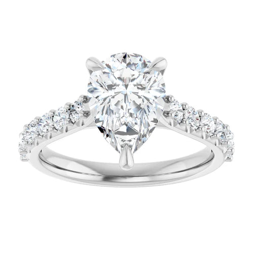 Load image 1 in gallery view. Face-up view of the pear-shape lab-grown diamond, its point held by a single prong and its shoulders by two more, with round accent diamonds tapering down the 14K white gold band