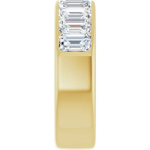 Load image 1 in gallery view. Wide 14K yellow gold anniversary band with a row of step-cut emerald diamonds held between smooth walls of gold