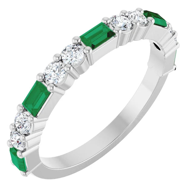 14K white gold wedding band with lab-grown emerald baguettes and round lab-grown diamonds, angled view