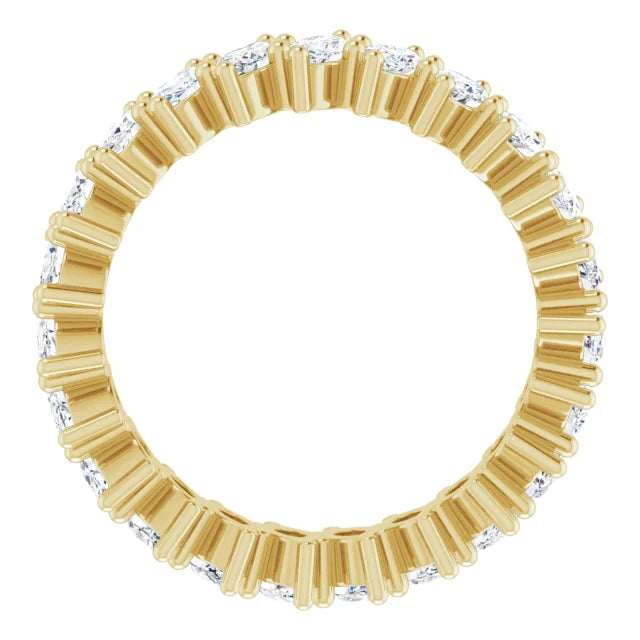 Gold ring with diamonds on a white background