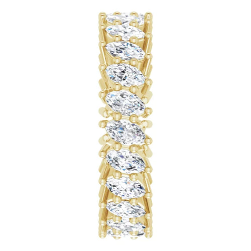 Load image 1 in gallery view. Gold ring with marquise-shaped diamonds on a white background