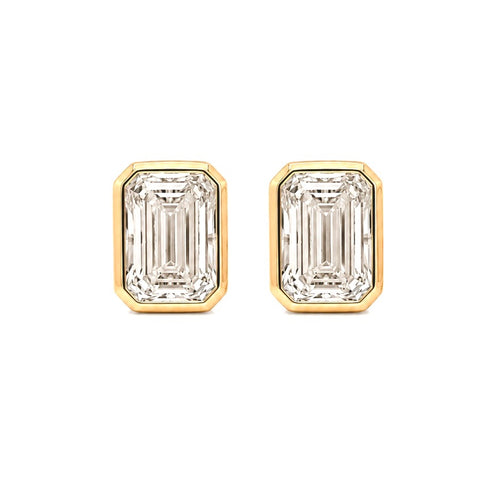 Load image 1 in gallery view. Pair of emerald-cut lab-grown diamond stud earrings in 14K yellow gold, shown face on, each step-cut stone framed in a smooth full bezel