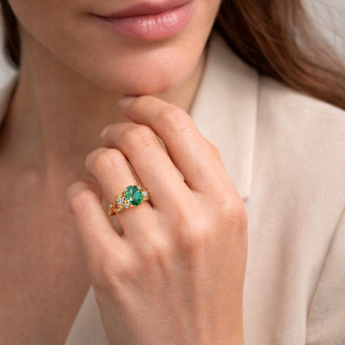 Load image 1 in gallery view. Render of the oval lab-grown green sapphire leaf engagement ring in 14K yellow gold, shown on the hand