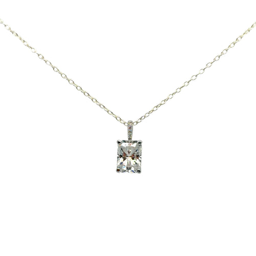 Load image 1 in gallery view. Front view of the 14K white gold solitaire pendant mounting with a radiant-cut moissanite and a diamond-set bail, hanging from a display chain. Chain and center stone are not included.