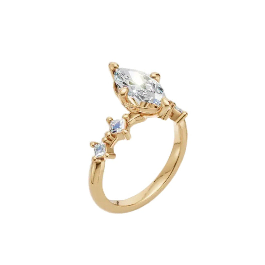 Custom 14K yellow gold engagement ring with a 1.21 carat marquise-cut lab-grown diamond, made at Farsi Jewelers