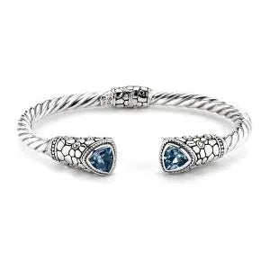 SS/18K TWISTED HINGED BANGLE W/ PEBBLE DESIGN BLUE TOPAZ ENDS - Farsi Jewelers
