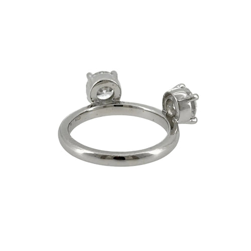 Load image 1 in gallery view. Back view of the platinum ring enhancer showing the polished band and both four-prong diamond settings