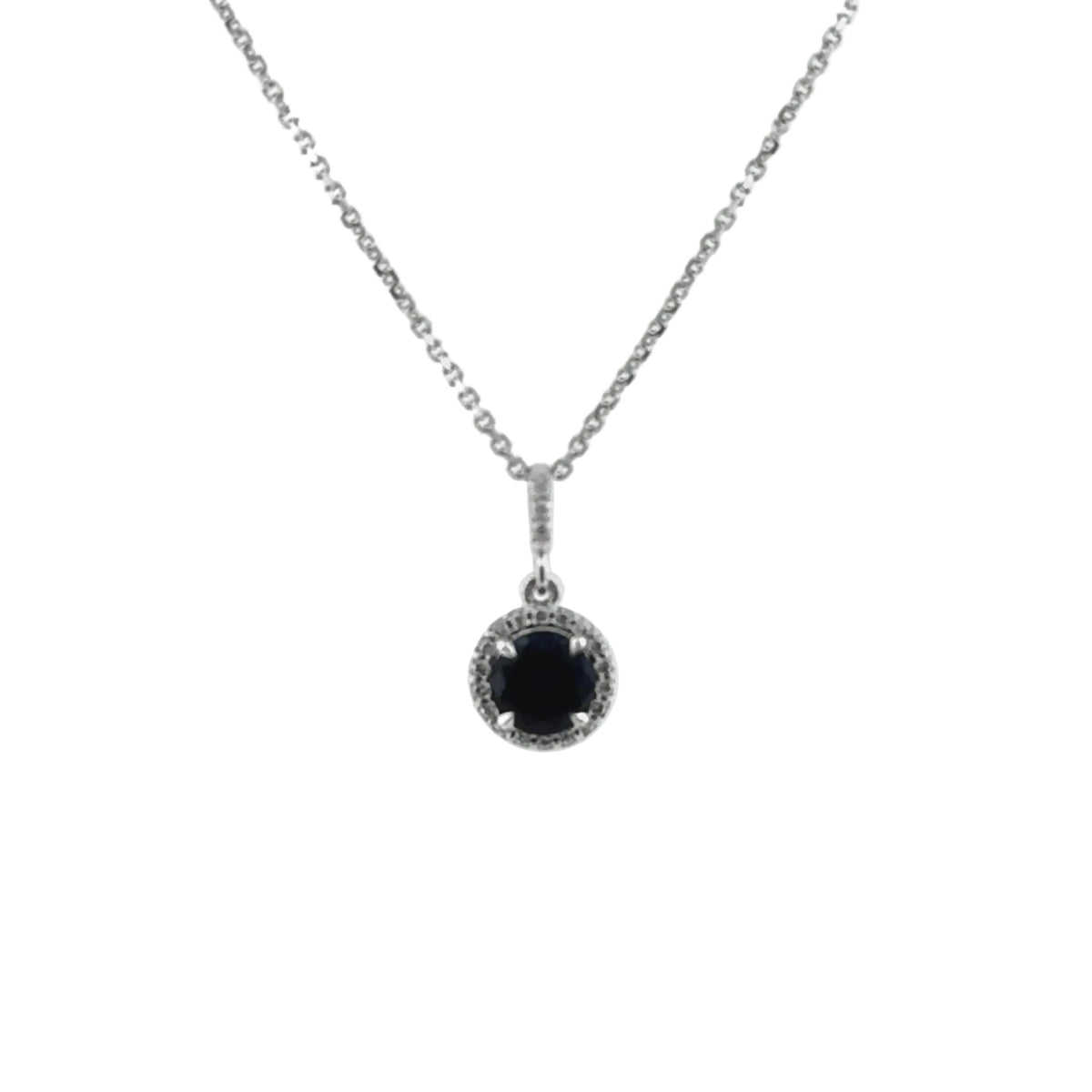 Round lab-grown blue sapphire in four prongs, circled by a diamond halo, hanging from a diamond-set bail on a fine 14K white gold cable chain, front view