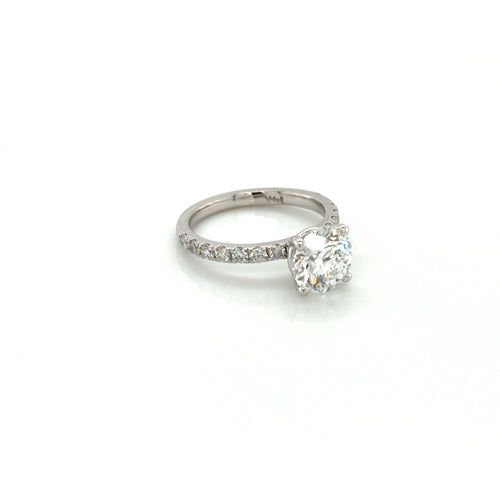 Load image 1 in gallery view. Restored 14K white gold four-prong solitaire engagement ring with a French-set pavé band, rebuilt at Farsi Jewelers in Sandy Springs