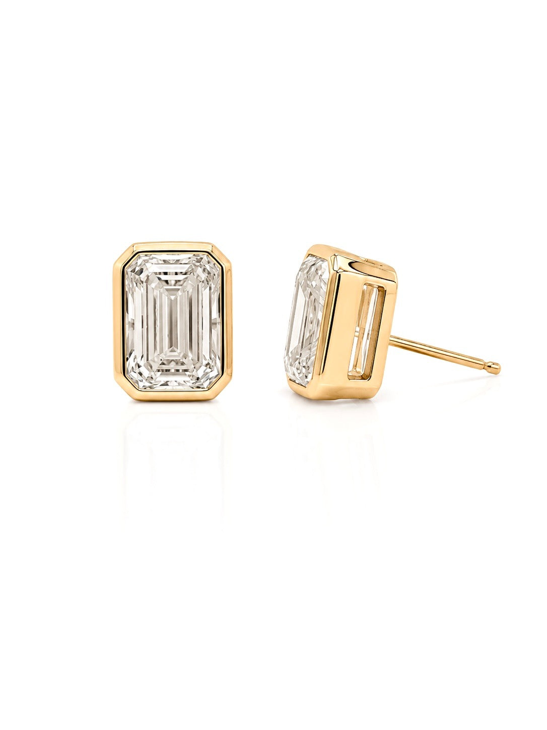 Emerald-cut lab-grown diamond bezel stud earrings in 14K yellow gold, one shown face on and one from the side with its friction post