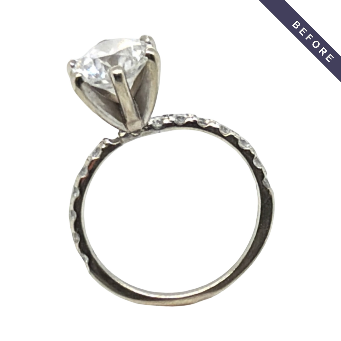 Before photo — the ring as it arrived at Farsi Jewelers, prior to the rebuild with French-set pavé diamond shoulders shown in the other images