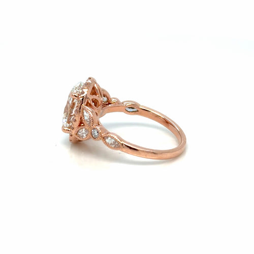 Load image 1 in gallery view. Side view of the 14K rose gold oval lab-grown diamond halo engagement ring showing the milgrain-edged bezel accents and pierced gallery, Farsi Jewelers