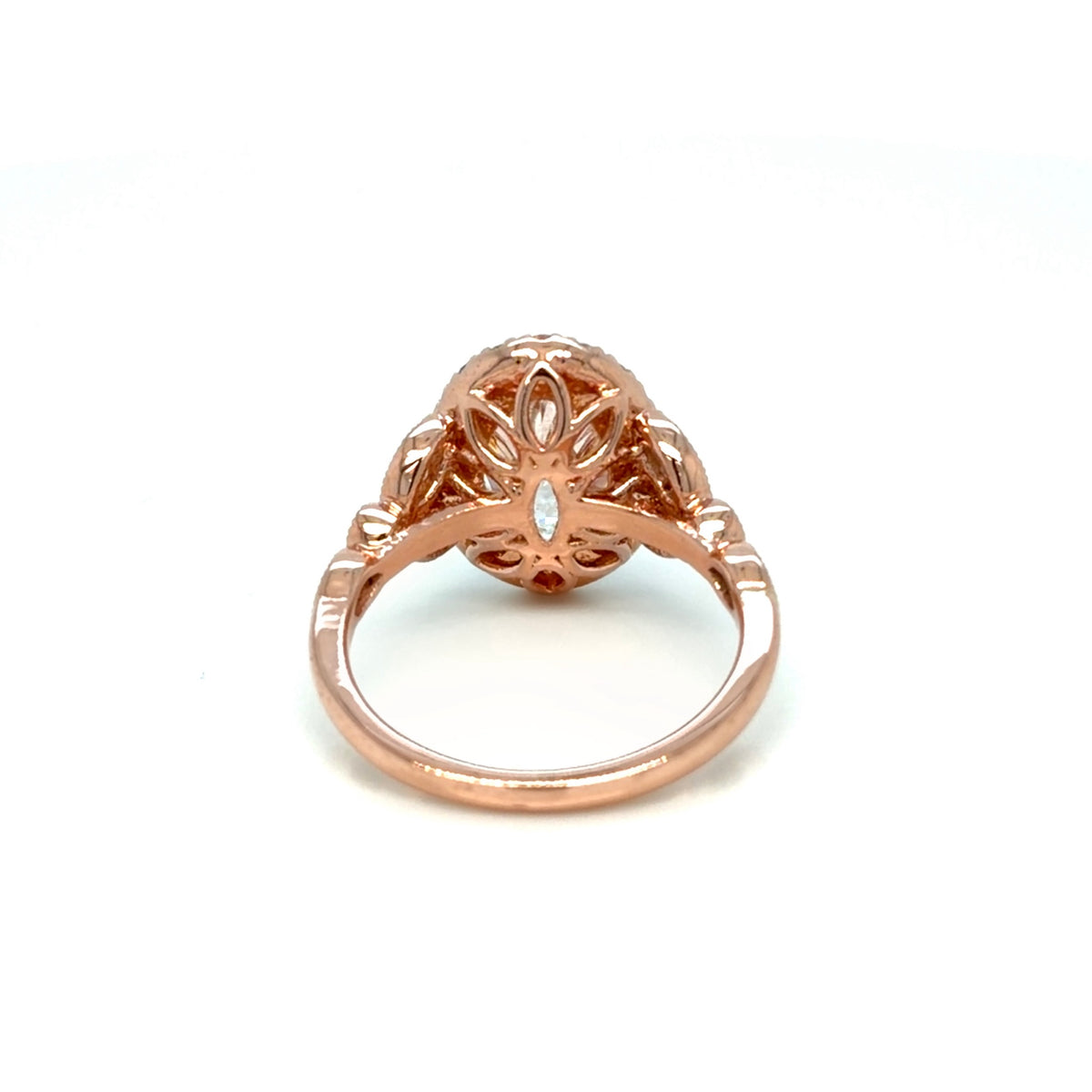 Back of the 14K rose gold halo engagement ring showing the pierced floral gallery beneath the oval lab-grown diamond, Farsi Jewelers