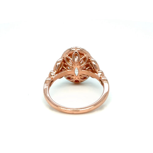 Load image 1 in gallery view. Back of the 14K rose gold halo engagement ring showing the pierced floral gallery beneath the oval lab-grown diamond, Farsi Jewelers