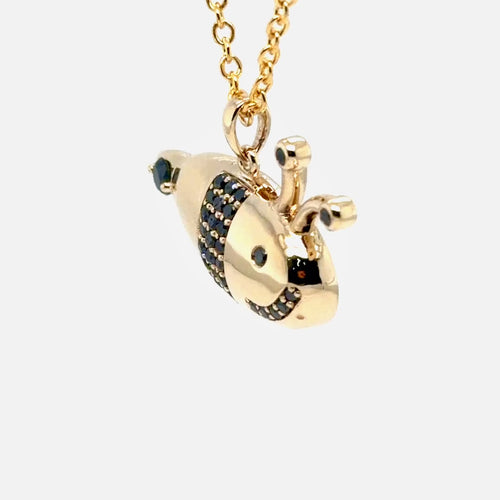 Load image 1 in gallery view. Video of the finished 14K yellow gold black diamond bumblebee pendant turning to catch the light