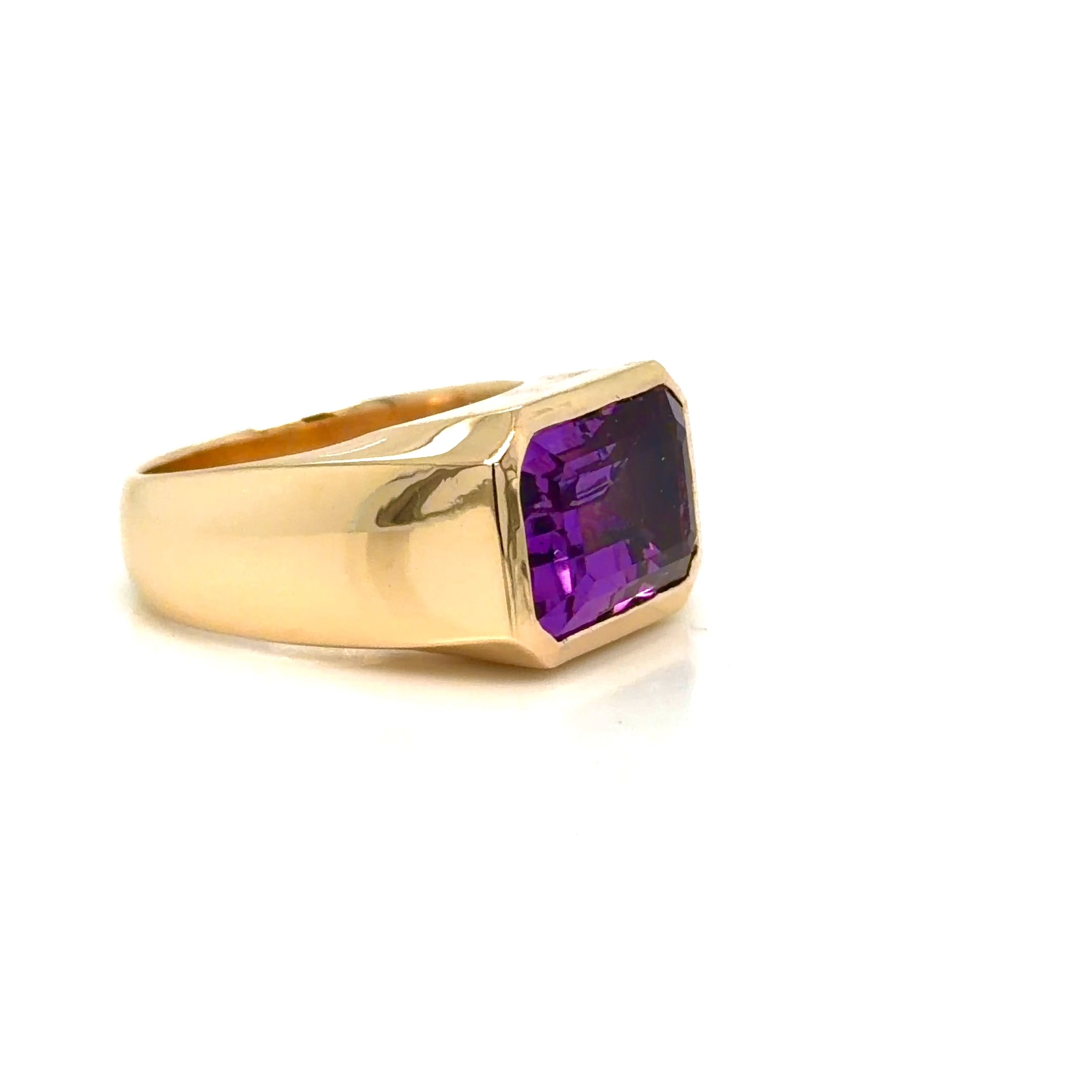 90-degree video of a custom 14K yellow gold east-to-west emerald-cut amethyst ring designed by Farsi Jewelers in Sandy Springs, Georgia.