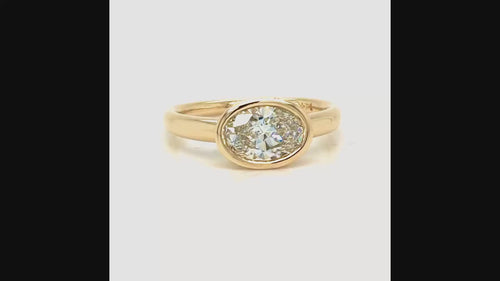 Load image 1 in gallery view. bezel set oval shape diamond in yellow gold 