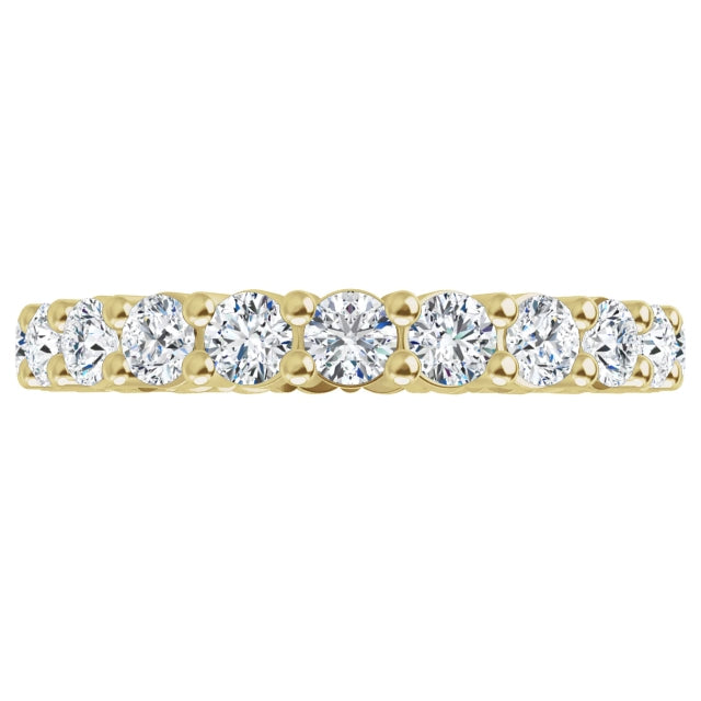 Diamond eternity wedding ring in yellow gold 