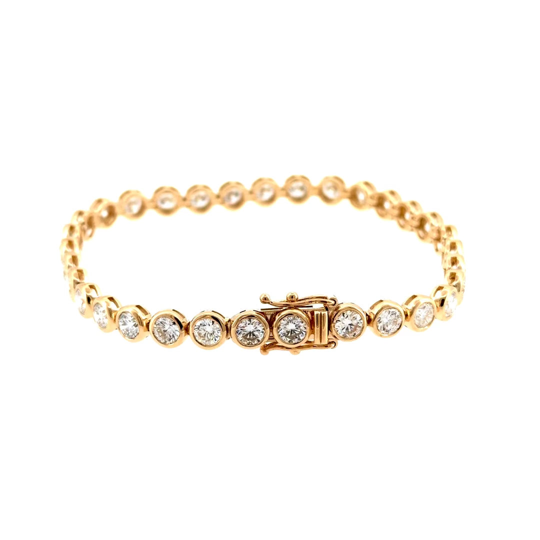 Video of the 14K yellow gold bezel lab-grown diamond tennis bracelet catching the light
