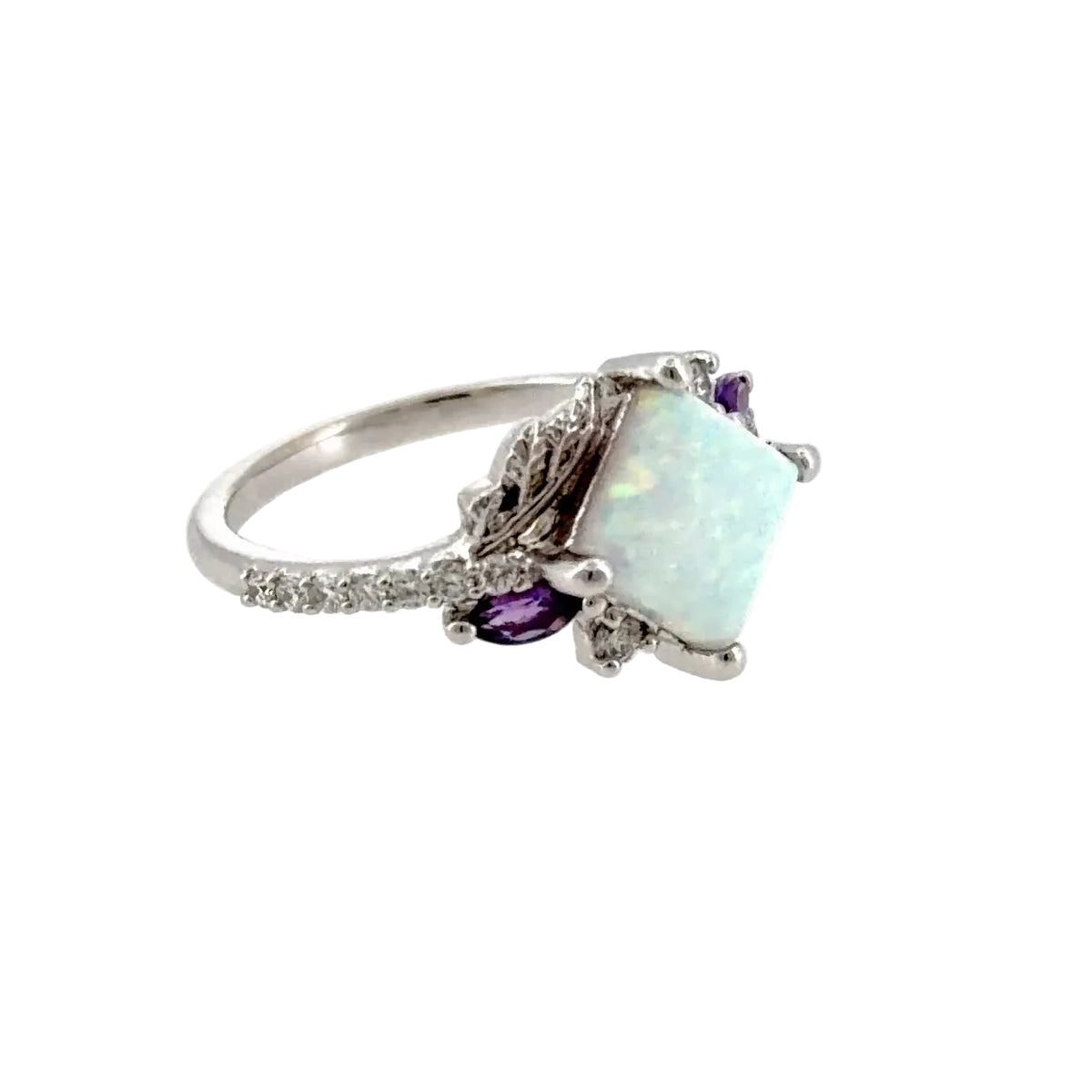 Side view of the square lab-grown opal floral engagement ring in 14K white gold, showing the leaf gallery and diamond shank