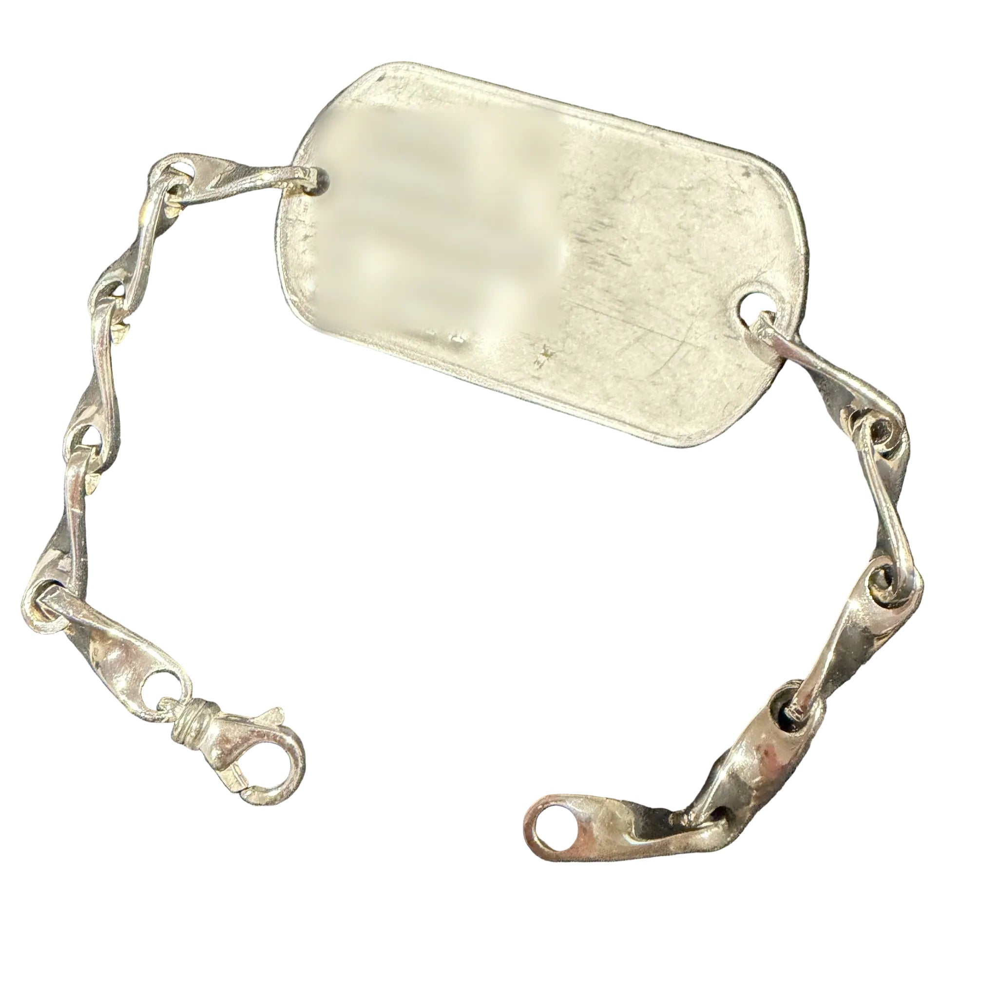 Sterling silver dog tag bracelet laid open on a white background, the Vietnam-era dog tag set inline between hand-formed twisted silver links, with a lobster clasp at one end